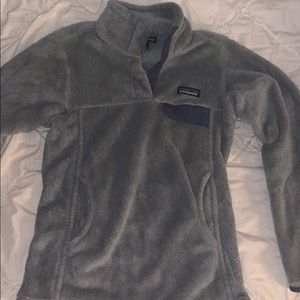 gray and purple fuzzy patagonia jacket